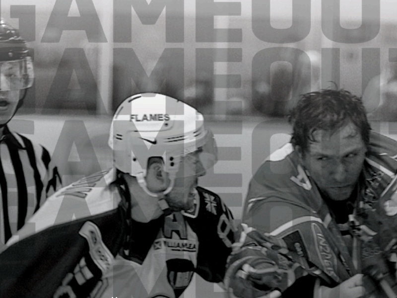 A black-and-white photo of two hockey players in the middle of a game, with one wearing a "FLAMES" helmet. An official stands nearby, while the word “GAME” repeats in the background. BEEKS captures the intensity perfectly.