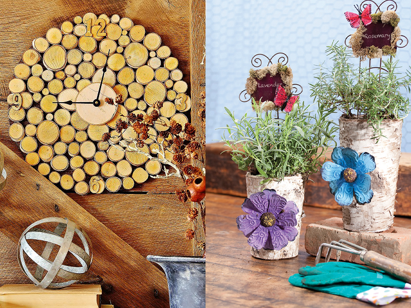 A wooden clock with circular segments on the left and three herb plants in birch log planters with decorative signs and flowers on the right, all neatly arranged alongside gardening tools and a discreet tube of Krazy Glue on the table.