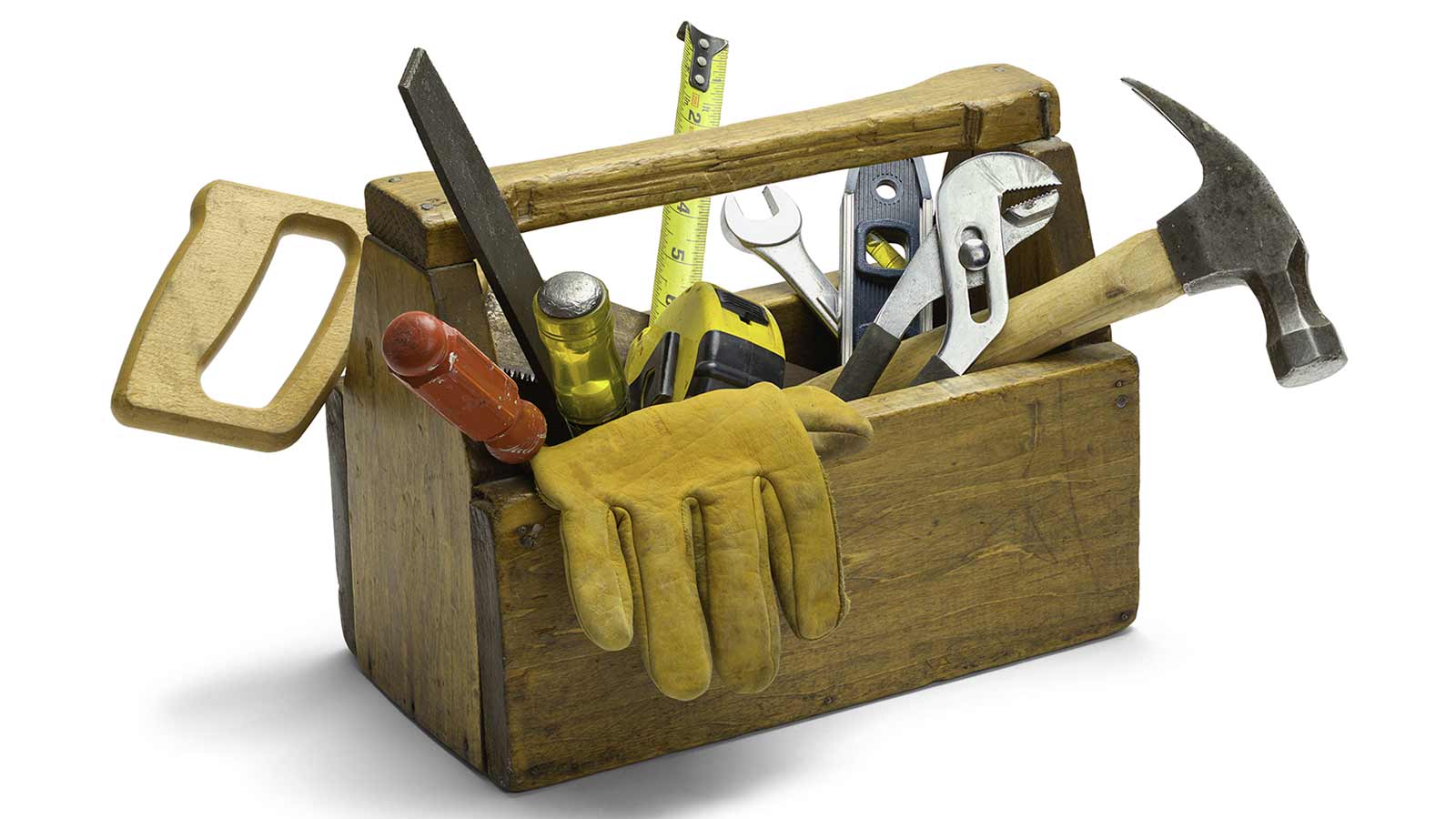 A wooden toolbox containing a hammer, wrench, tape measure, screwdriver, pliers, and yellow work gloves is the next-best design tool for any hands-on project.